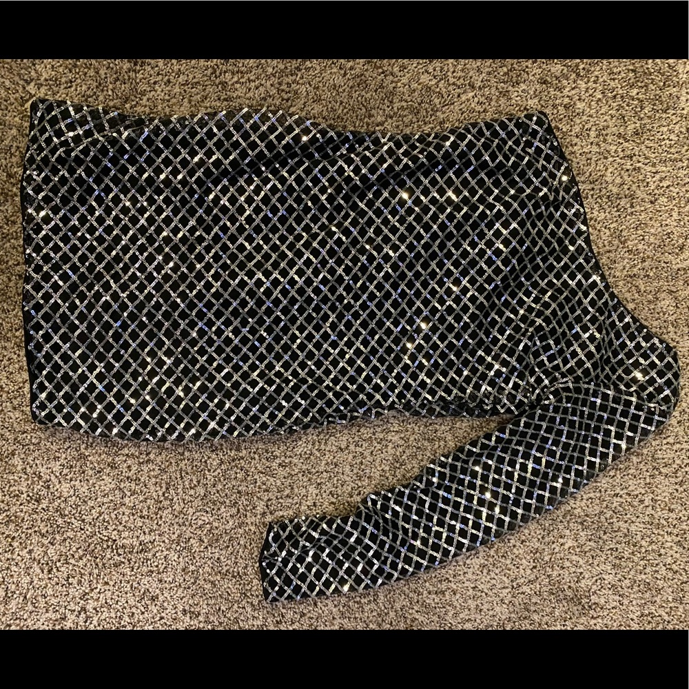 One shoulder black/silver mini dress.